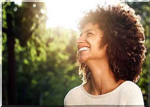 Woman enjoying the benefits of laughter