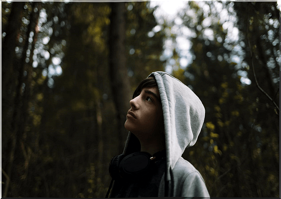 teenager in the forest