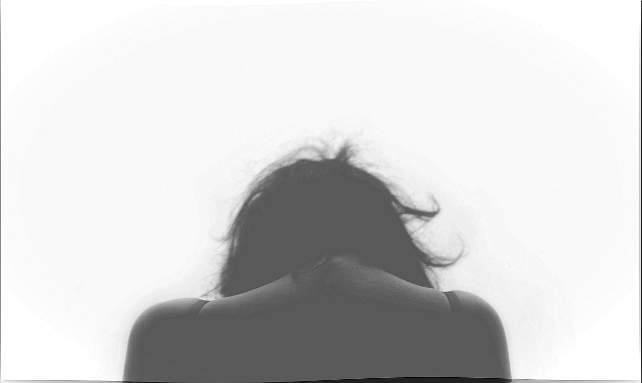 sad woman with her back