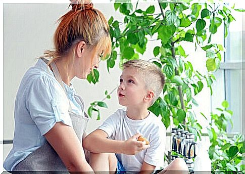 Mother talking to her son about tantrums