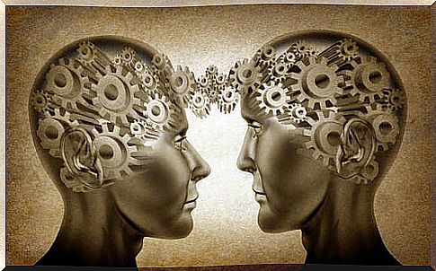 Heads of two people looking at each other