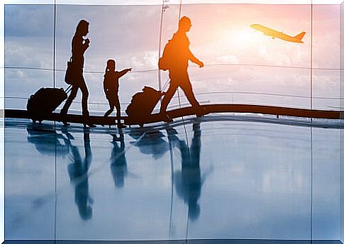 Family with suitcases