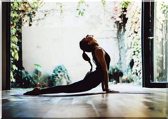 Woman doing cobra pose