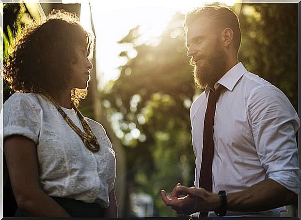 Man having eye contact with a woman