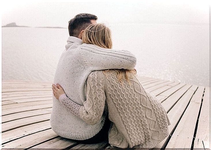 Couple hugging symbolizing love in smart people