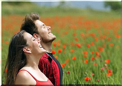 Woman and man breathing outdoors