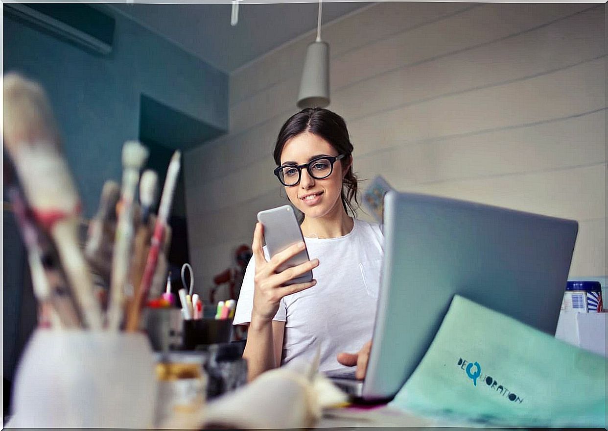 Girl working distracted with mobile