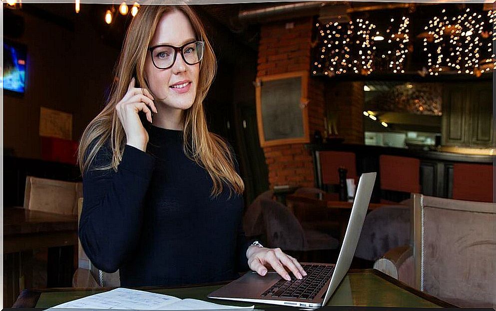 Girl with glasses and computer