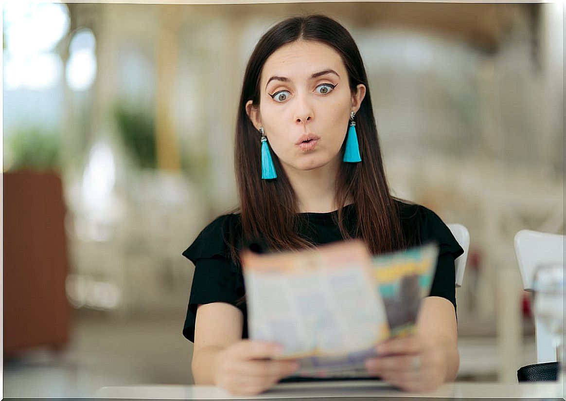 Woman reading horoscope