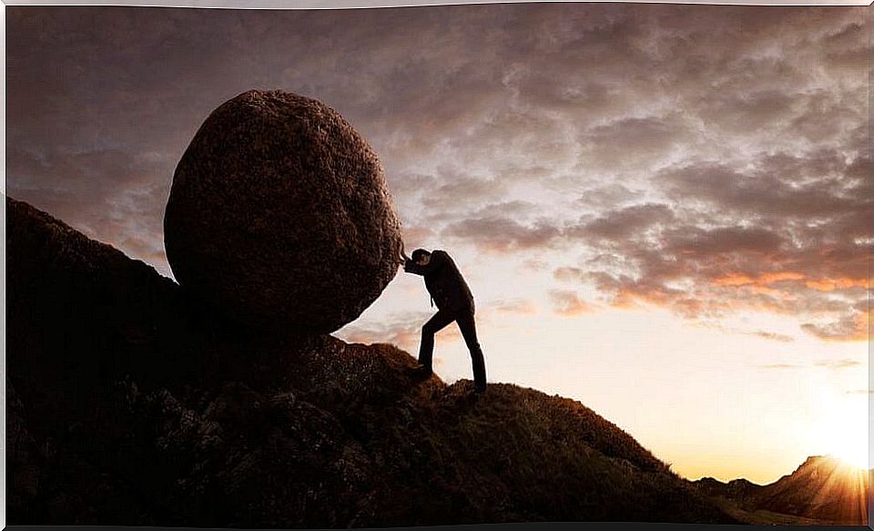 Man pushing a stone