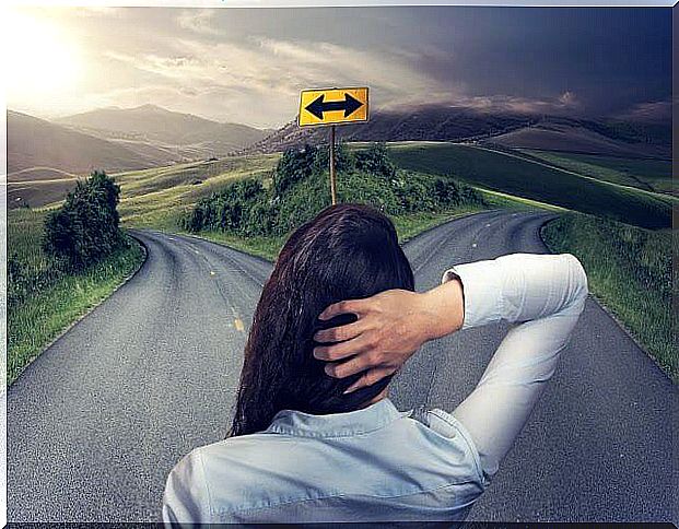 Woman before two roads