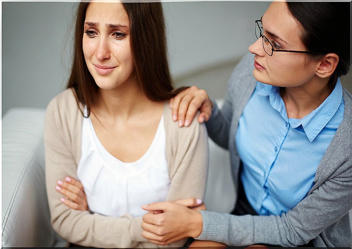 Crying girl in psychological consultation