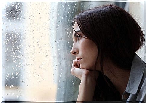 Sad woman thinking about forgetting her great love