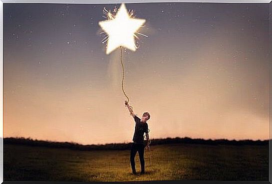 man with star symbolizing the theory of small achievements