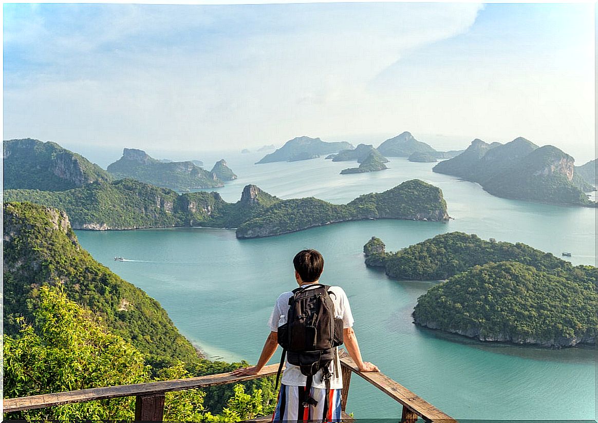 Man with backpack enjoying a landscape