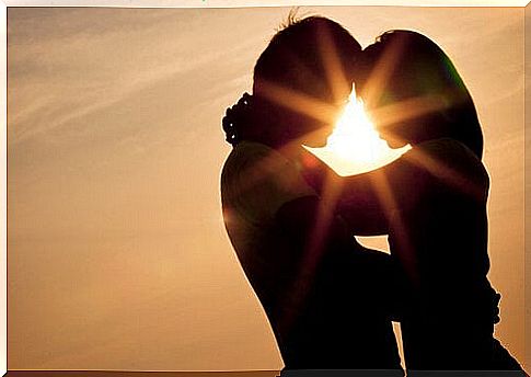 Couple at sunset depicting twilight love