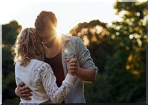 Couple dancing outdoors